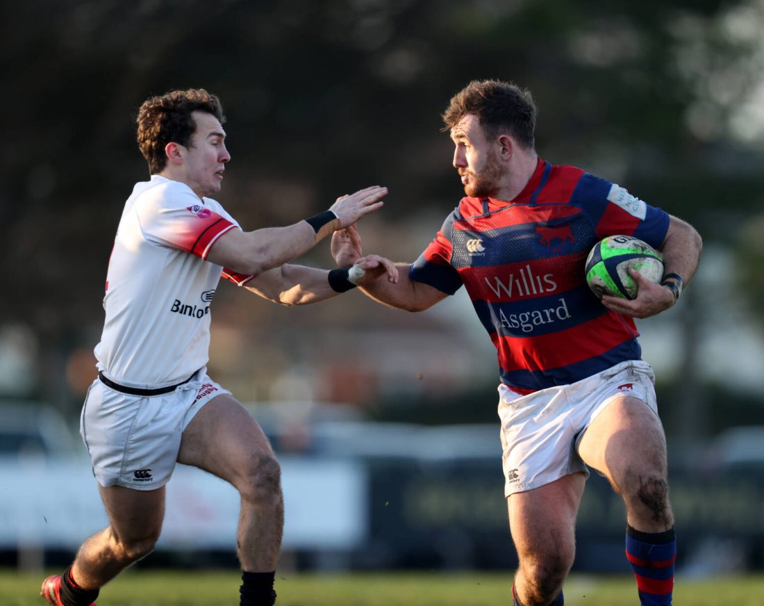 Energia All-Ireland League Division 1A, Clontarf Rugby Club, Castle Avenue, Dublin 4/12/2021
Clontarf vs Dublin University
Clontarf's Dylan Donnellan tries to avoid a tackle by Ronan Quinn of Dublin University
Mandatory Credit ©INPHO/Tom Maher